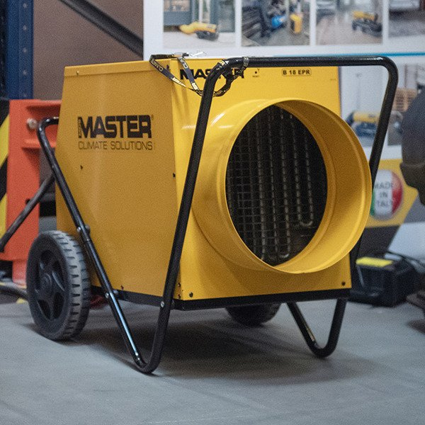 Nagrzewnica elektryczna Master B 18 EPR – widok w warsztacie na żółtą obudowę, duży wylot powietrza, koła i metalową ramę transportową, Techfix Radom